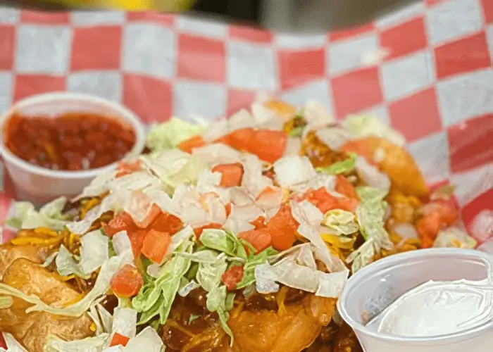 Quil Ceda Deli Signature Frybread taco, salsa and sour cream.