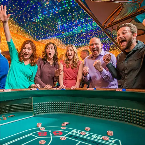 Guests playing at a table game. Tulalip casino